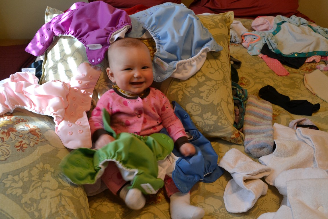 Helping daddy put together cloth diapers