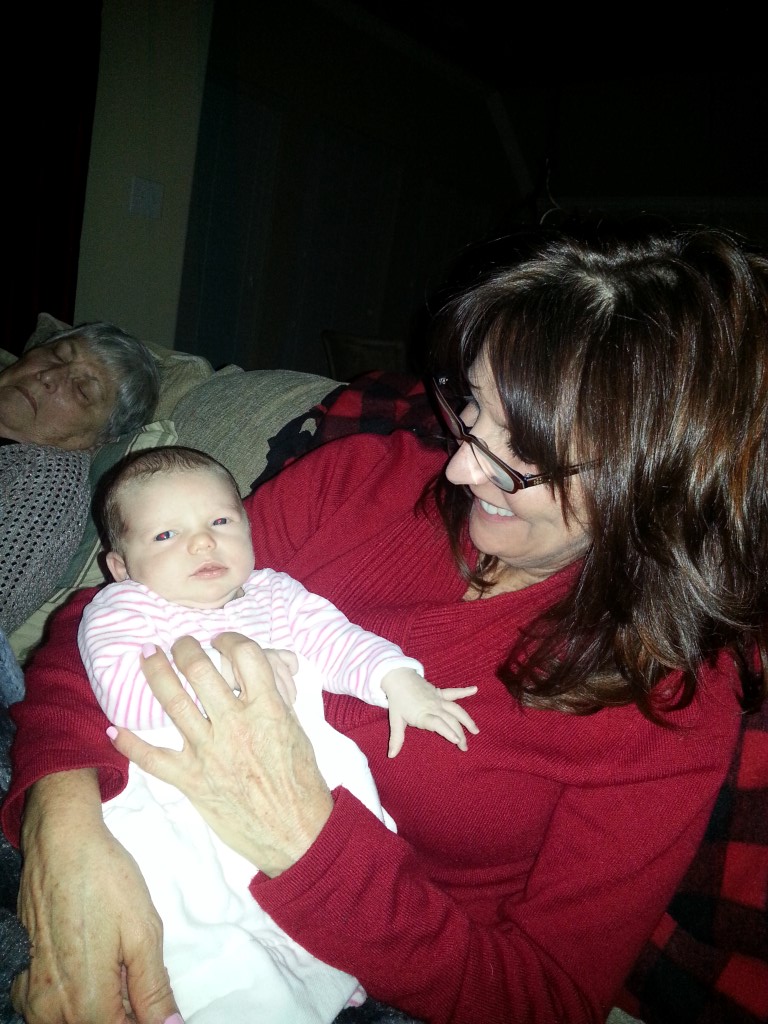 Not sure what's happening, but G-Ma is keeping me warm! 11/26/13